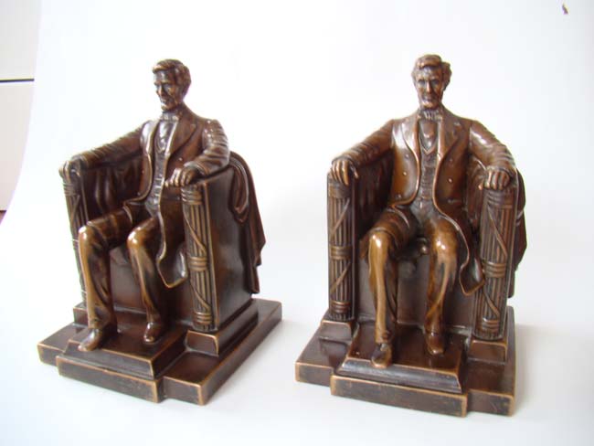 A fine pair of "Lincoln in the chair" bookends by Jennings Brothers circa 1925